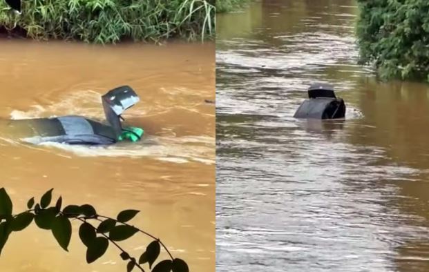 Motorista não aciona freio de mão ao parar em posto e carro cai dentro do rio Sapucaí