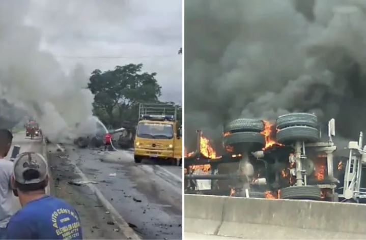 Carreta tomba após colidir contra caminhão, pega fogo e deixa feridos na BR-040, em Juiz de Fora