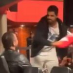 Homem agride influencer com bandeira do PT em debate sobre escolas cívico-militares em MG